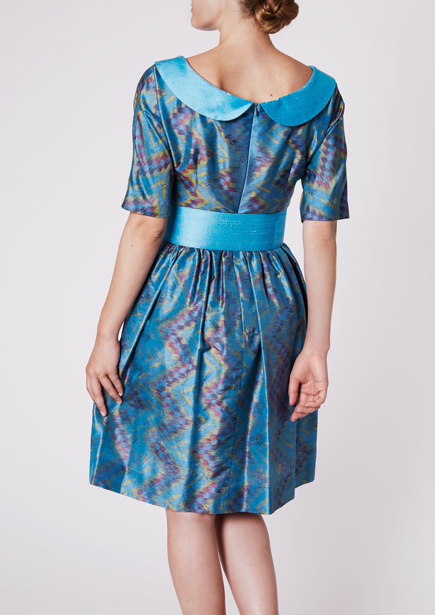 Cocktail dress with wide round collar in Ikat-silk, shining steel blue - Back view